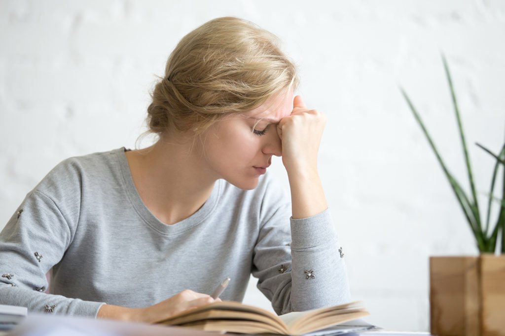woman in pain due to vertigo